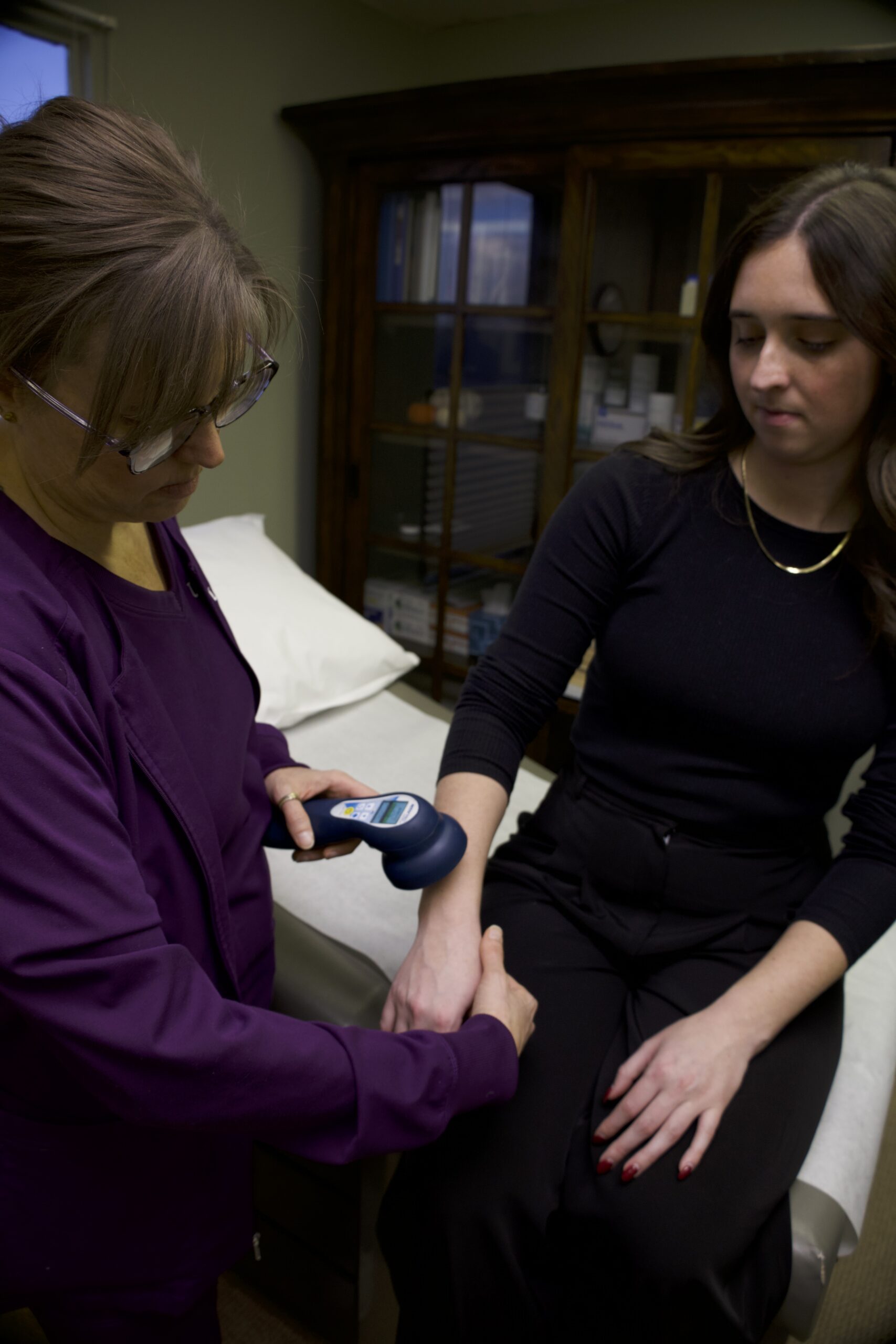 Functional medicine consultation in Omaha addressing stress hormone imbalance and its effects on thyroid signaling, metabolism, and weight regulation.