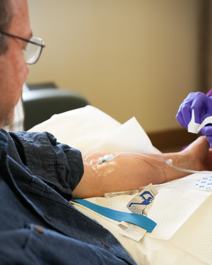 patient receiving IV therapy for fatigue and energy support