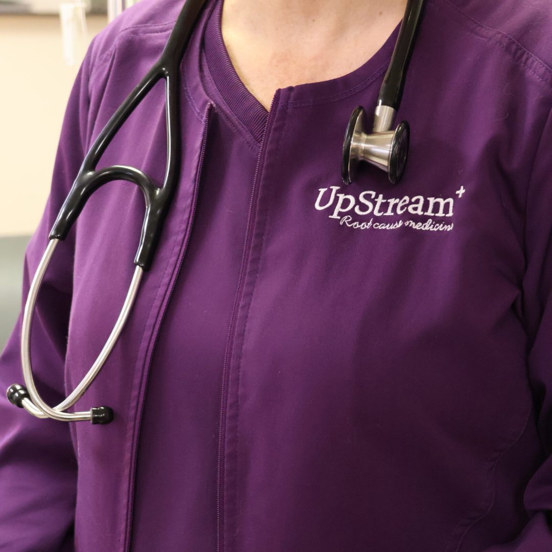 Functional medicine provider at UpStream Root Cause Medicine in Omaha, illustrating a systems-based approach to root cause fatigue in Omaha.